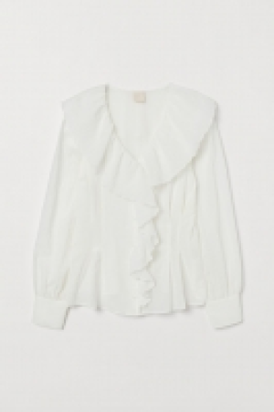  Blusa con volantes 17.99 €
