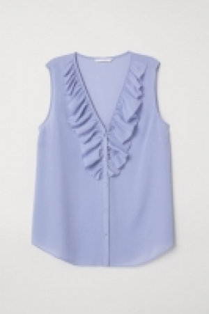  Blusa en V con volante 9.99 €