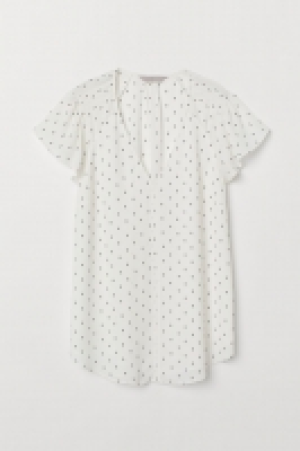  Blusa con mangas de volante 12.99 €