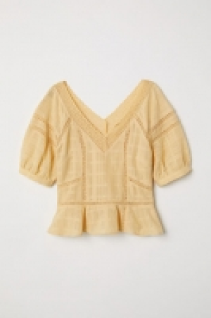  Blusa de algodón cuello en V 23.99 €