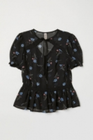  Blusa con mangas abullonadas 19.99 €