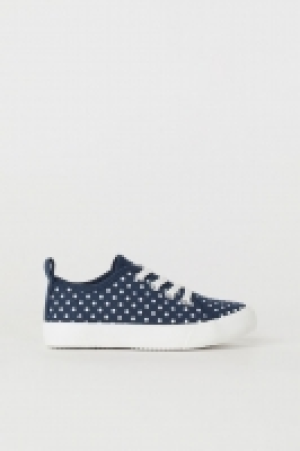  Zapatillas deportivas de lona 4.99 €