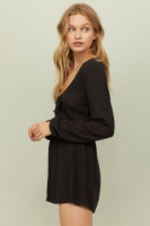  Mono corto con detalle anudado 11.99 €