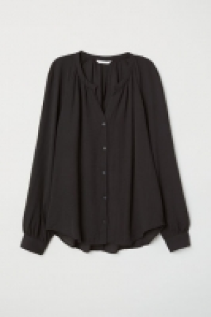  Blusa en tejido de crepé 9.99 €