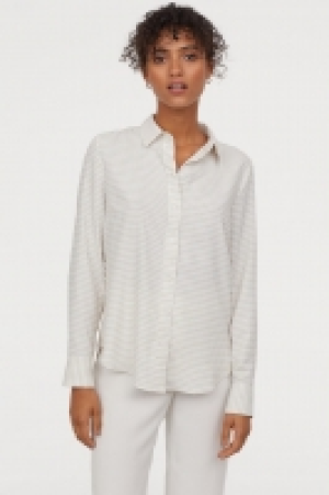  Blusa en tejido de crepé 8.99 €