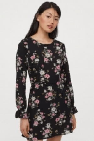  Vestido en crepé 8.99 €
