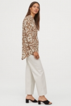  Blusa en tejido vaporoso 14.99 €