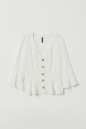  Blusa con volante 12.99 €
