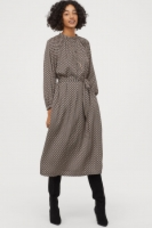  Vestido con cinturón de anudar 22.99 €