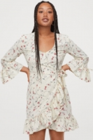  Vestido cruzado estampado 14.99 €