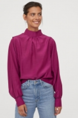  Blusa con cuello elevado 29.99 €