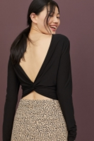  Top con escote V en espalda 6.99 €