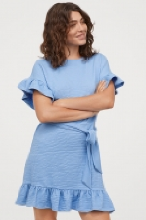  Vestido con volante 16.99 €