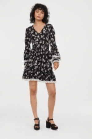  Vestido con mangas trompeta 18.99 €