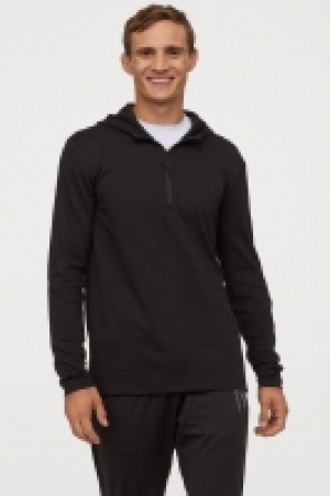  Top de deporte con capucha 14.99 €