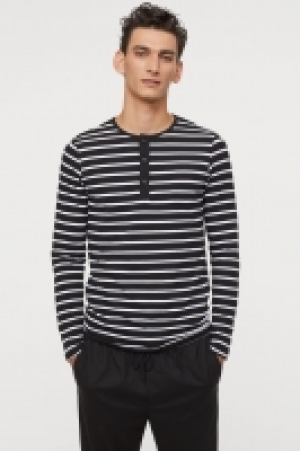  Top de manga larga Muscle fit 8.99 €