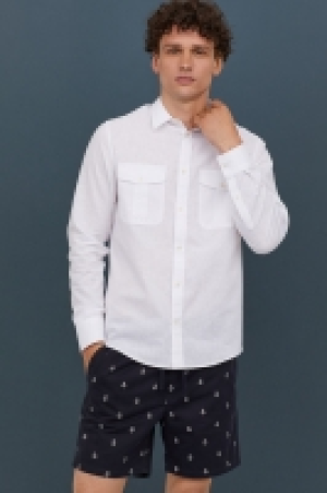  Camisa en mezcla de lino 14.99 €