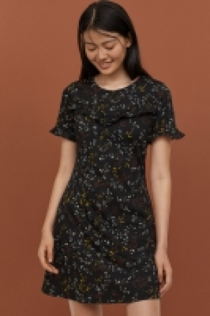  Vestido con volantes 12.99 €