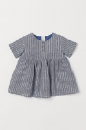  Vestido en mezcla de lino 8.99 €