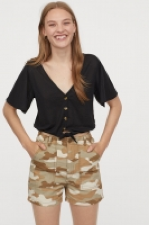  Top corto con lazada 3.99 €