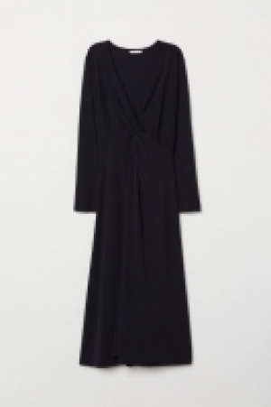  Vestido con escote de pico 24.99 €