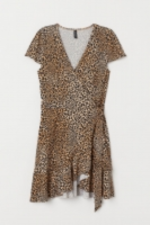  Vestido cruzado con volantes 7.99 €