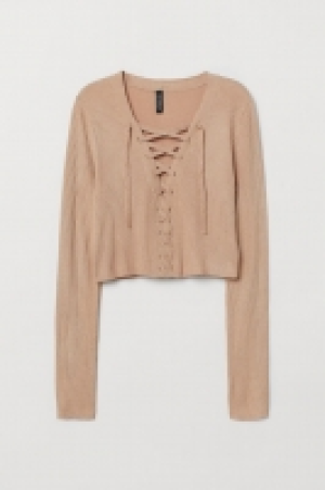  Top corto con lazada 9.99 €