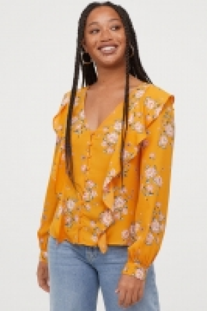  Blusa con volantes 8.99 €