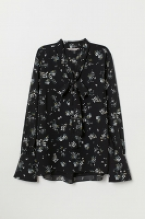  Blusa con lazada 14.99 €