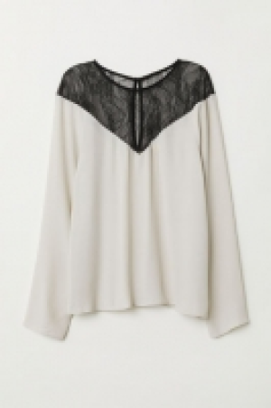 Top con canesú de encaje 17.99 €