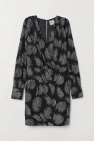  Vestido con escote de pico 39.99 €