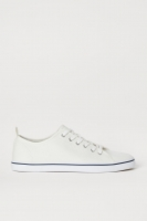  Zapatillas deportivas de lona 9.99 €