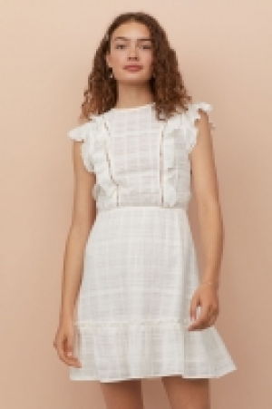  Vestido con volantes 16.99 €
