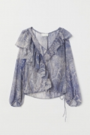  Blusa vaporosa con lyocell 29.99 €