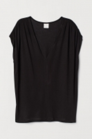  Top de punto con escote en V 5.99 €