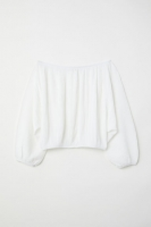  Blusa hombro descubierto 17.99 €