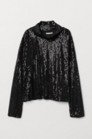  Top con lentejuelas 17.99 €