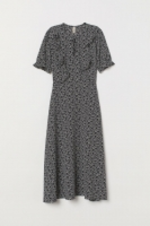  Vestido con volante 20.99 €