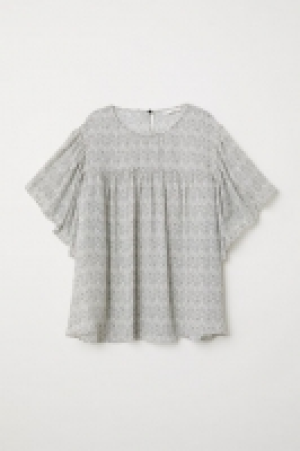 Blusa con mangas de volante 11.99 €