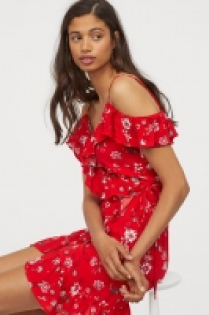  Vestido cruzado con volantes 14.99 €