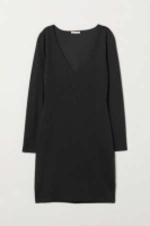  Vestido de punto escote en V 13.99 €