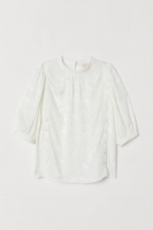  Blusa con mangas abullonadas 22.99 €