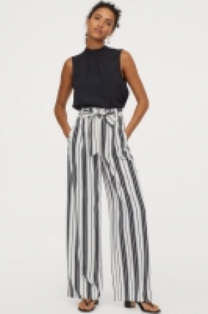  Pantalón con cinturón de atar 17.99 €