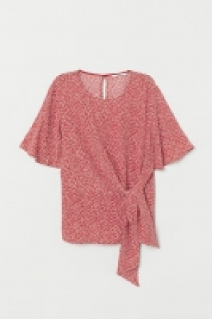  Blusa con lazada 12.99 €