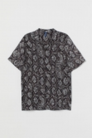  Camisa resort estampada 8.99 €