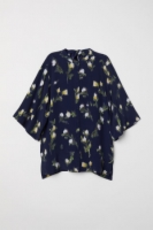  Blusa en tejido de crepé 23.99 €