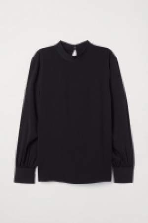  Blusa con cuello elevado 14.99 €