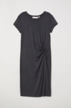  Vestido drapeado de punto 11.99 €