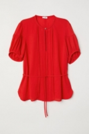  Blusa con mangas abullonadas 23.99 €