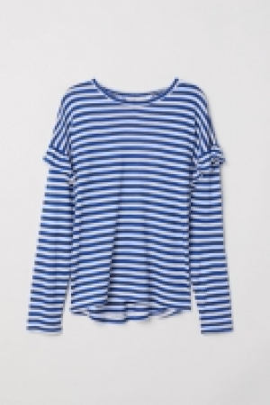  Top con volantes 6.99 €
